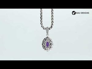 Sterling silver oval pendant with faceted Amethyst Quartz and rope-accent detailing.