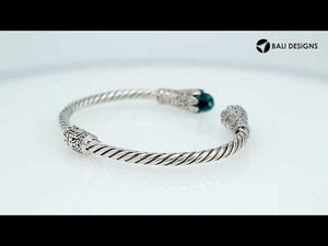 Sterling silver handcrafted bangle with Blue Topaz Quartz, twisted rope Balinese design.