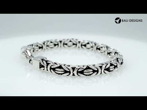 Wholesale sterling silver bracelet featuring a bold 7MM Balinese woven chain with oxidized accents and a secure lobster lock designed for premium bulk catalogs.