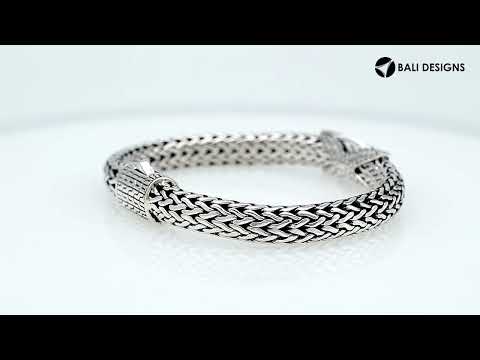 Sterling Silver woven chain bracelet featuring a polished push clasp and a Sapphire Quartz crisscross centerpiece, crafted with detailed metalwork for durable, elegant, and high-quality wholesale presentation.