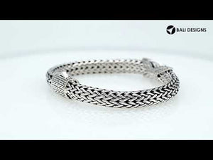 Sterling Silver woven chain bracelet featuring a polished push clasp and a Sapphire Quartz crisscross centerpiece, crafted with detailed metalwork for durable, elegant, and high-quality wholesale presentation.