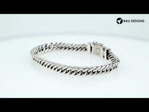 Sterling Silver chain bracelet featuring a polished surface and a secure push clasp decorated with tribal pattern detailing, crafted for durable everyday wear and elegant appeal.