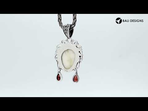 Sterling Silver Garnet Quartz Bone Face Pendant With Ornate Balinese Filigree.