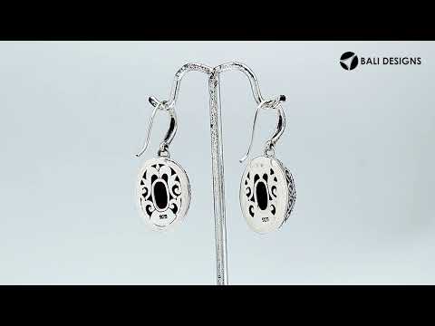 Sterling silver oval drop earrings with Ruby and decorative oxidized silver detailing for wholesale collections.