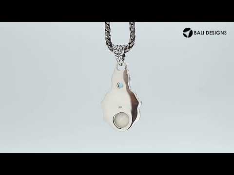 Wholesale bone face pendant with peridot quartz in sterling silver, handcrafted in Bali.