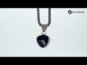 Sterling silver Mystic Quartz trillion pendant with detailed Balinese frame.