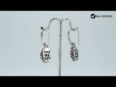 Wholesale sterling silver earrings with oval Citrine Quartz set in ornate scroll-accent frames.