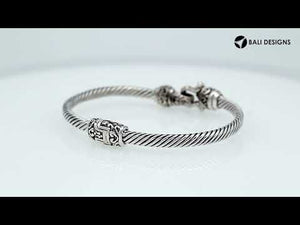 Sterling silver twisted bangle with Balinese detailing and hook clasp handcrafted in Bali.