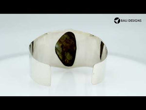 Wholesale sterling silver cuff bracelet featuring a large labradorite stone surrounded by detailed Bali filigree patterns, crafted for premium bulk jewelry selections.