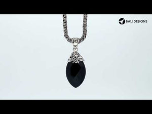 Sterling Silver Carved Design Black Onyx Pendant