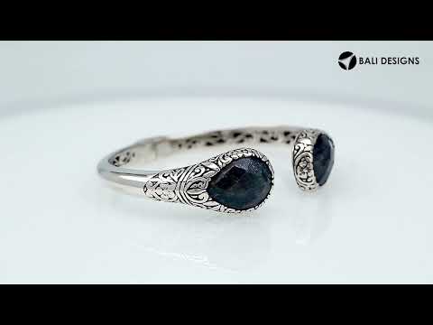 Wholesale sterling silver Bali engraved hinge cuff bracelet featuring sapphire quartz ends and polished–oxidized detailing, crafted to meet premium bulk jewelry inventory standards.