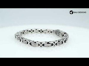 A wholesale sterling silver chain bracelet featuring thick Balinese links, oxidized detailing, polished finishing, and a secure push clasp suitable for premium bulk jewelry purchasing.