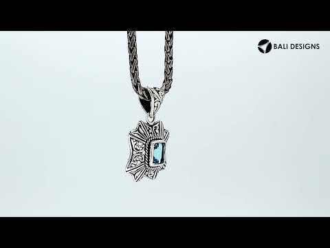 Sterling silver rectangular pendant with Blue Topaz Quartz and handcrafted Balinese filigree design.