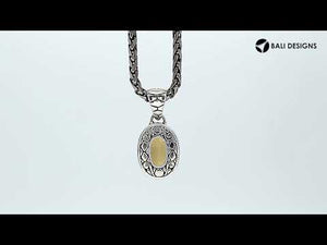 Sterling silver oval pendant with faceted Citrine Quartz and Balinese scroll back design, wholesale Quartz jewelry.