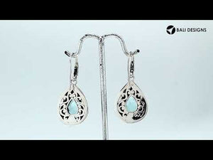 Wholesale sterling silver Amethyst Quartz teardrop earwire earrings featuring intricate carved borders, decorative silver beadwork, antique-polished finish, and handcrafted artisanal detailing from Bali.