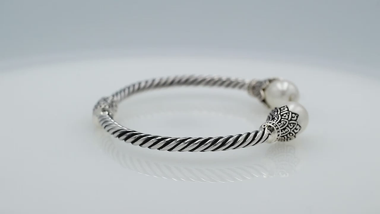 925 Sterling Silver Balinese Twisted Bangle With Shell Pearl And Hinge Lock On White Background