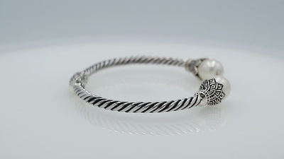 925 Sterling Silver Balinese Twisted Bangle With Shell Pearl And Hinge Lock On White Background