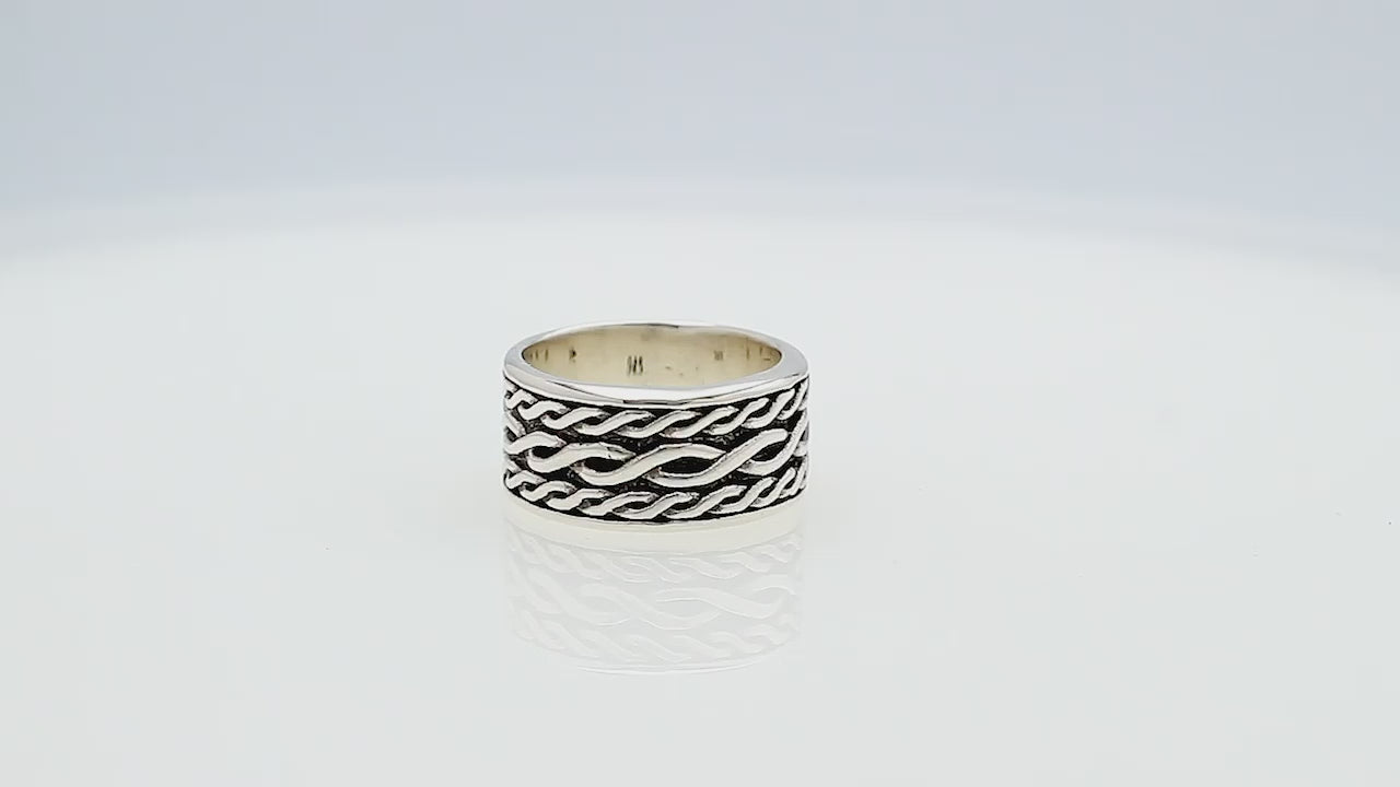 Wholesale sterling silver wide band ring with wavy braid Bali-inspired design and oxidized details, handcrafted unisex artisan jewelry in bulk for retailers and resellers.