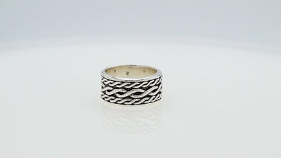 Wholesale sterling silver wide band ring with wavy braid Bali-inspired design and oxidized details, handcrafted unisex artisan jewelry in bulk for retailers and resellers.
