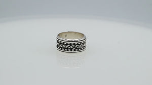 Wholesale sterling silver braided band rings with oxidized rope design, wide unisex silver jewelry for bulk resellers.