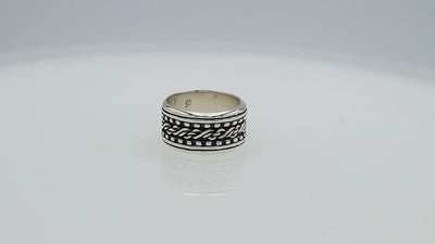 Wholesale sterling silver braided band rings with oxidized rope design, wide unisex silver jewelry for bulk resellers.