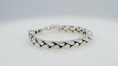 Wholesale sterling silver bracelet featuring a 6MM flat-weave chain design with polished and oxidized detailing and a durable, secure lobster lock closure.