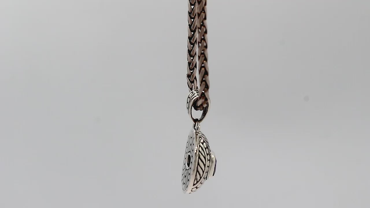 Sterling silver cushion pendant featuring Amethyst Quartz with detailed dome carving and oxidized Balinese silverwork.