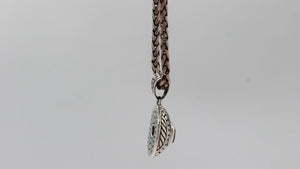 Sterling silver cushion pendant featuring Amethyst Quartz with detailed dome carving and oxidized Balinese silverwork.