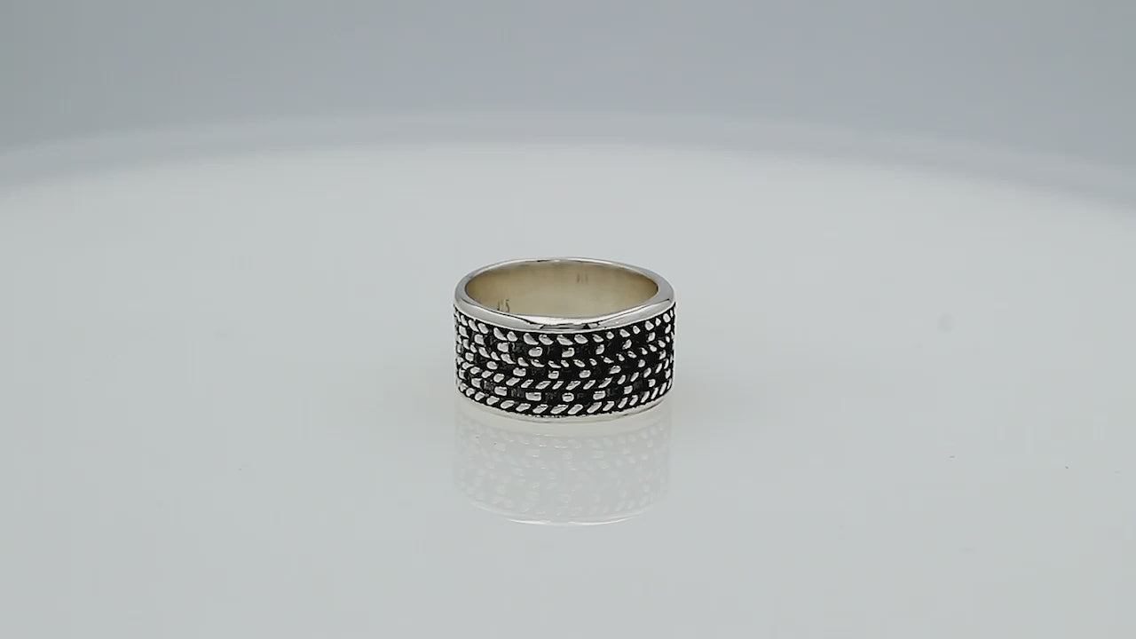 Sterling silver wholesale wide band ring with intricate Bali dot pattern, handcrafted 925 silver unisex jewelry for bulk orders.