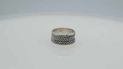 Wholesale sterling silver wide band ring with intricate tribal Bali design, handcrafted in 925 silver with oxidized detailing for jewelry retailers and bulk buyers.