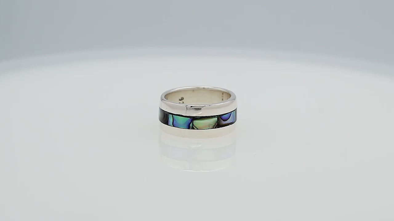 Wholesale sterling silver wide band ring with iridescent Abalone Shell inlay, handcrafted unisex jewelry in bulk for retailers and resellers.