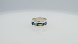 Wholesale sterling silver wide band ring with iridescent Abalone Shell inlay, handcrafted unisex jewelry in bulk for retailers and resellers.