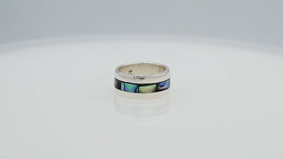 Wholesale sterling silver wide band ring with iridescent Abalone Shell inlay, handcrafted unisex jewelry in bulk for retailers and resellers.