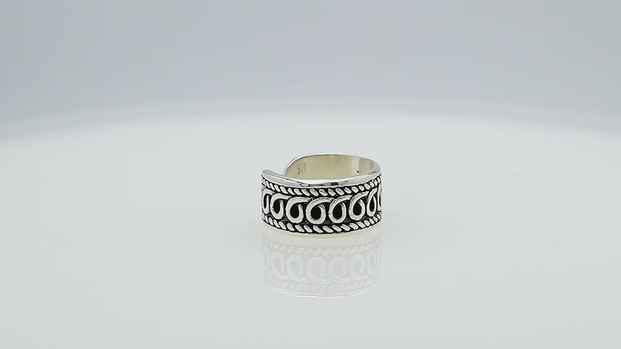 Wholesale sterling silver open-band ring with intricate Bali swirl design and oxidized details, adjustable handcrafted unisex artisan jewelry in bulk for retailers and resellers.