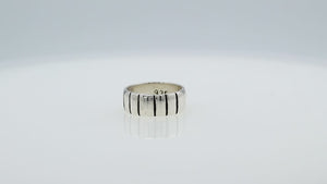 Wholesale sterling silver band ring with vertical oxidized stripe design, wide unisex 925 silver ring handcrafted in Bali for bulk orders and resellers.