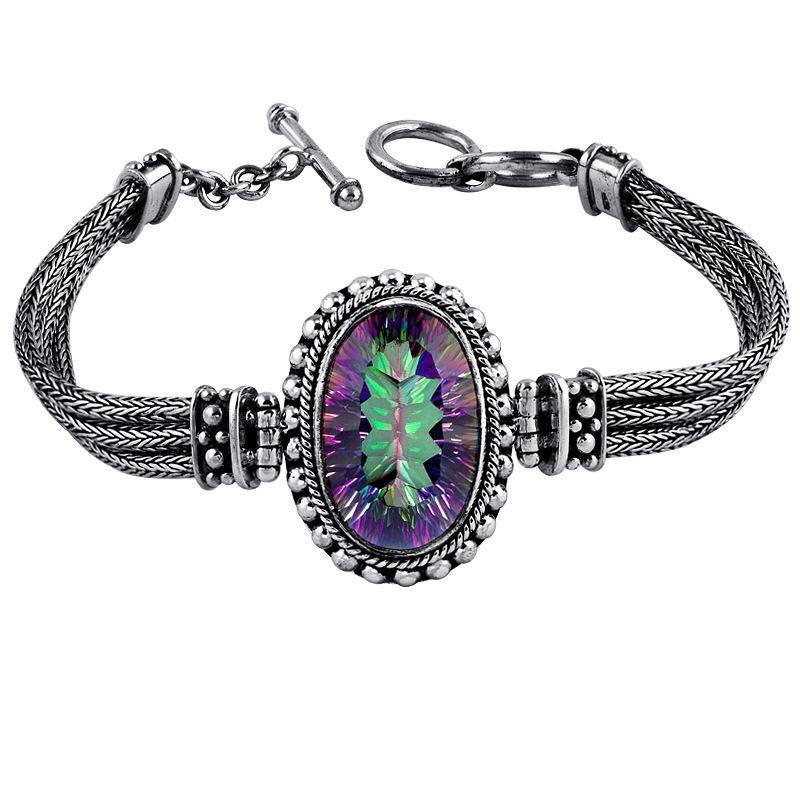 Sterling silver bracelet with oval faceted Mystic Quartz , handcrafted in Bali with Balinese chain and bead accents – wholesale gemstone jewelry supplier.