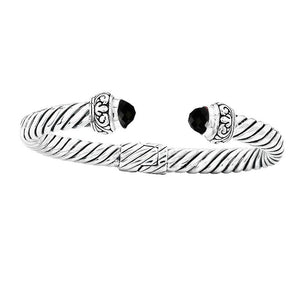 Sterling silver twisted cable cuff bracelet with faceted black onyx, handcrafted in Bali for wholesale jewelry buyers.