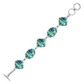 Sterling silver bracelet with oval and square abalone shell links, polished finish.