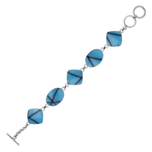 terling silver bracelet with alternating oval and cushion turquoise shell links, polished finish.