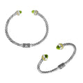 Wholesale sterling silver bangle with Peridot Quartz stones, twisted rope design, oxidized finish, and 18K gold plating, handmade in Bali.