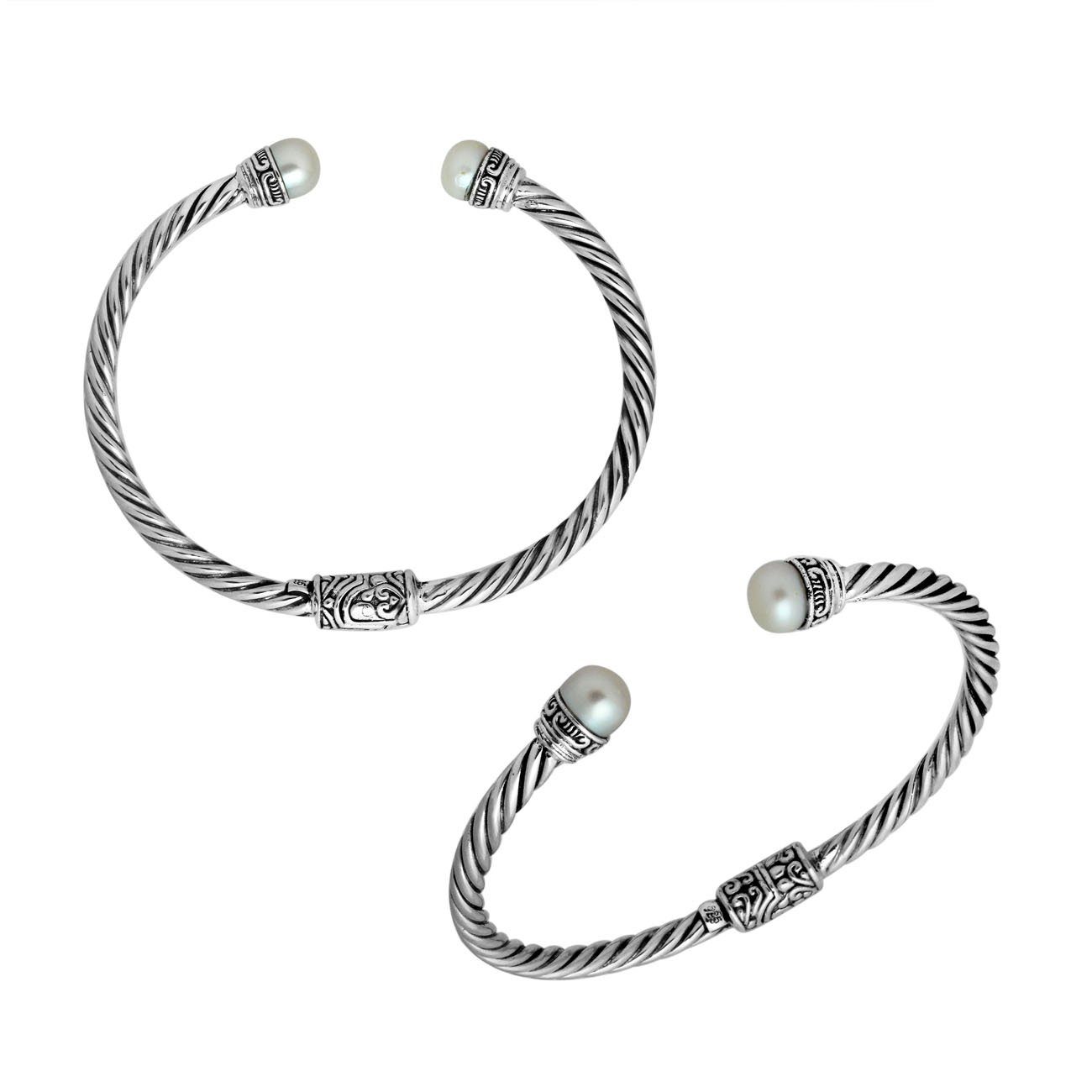 Wholesale sterling silver Pearl bangle with twisted rope design, Balinese motifs, and oxidized finish, handcrafted in Bali.