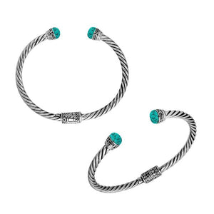 Wholesale sterling silver bangle with turquoise shell cabochons, twisted rope design, and Balinese motifs, handcrafted in Bali.