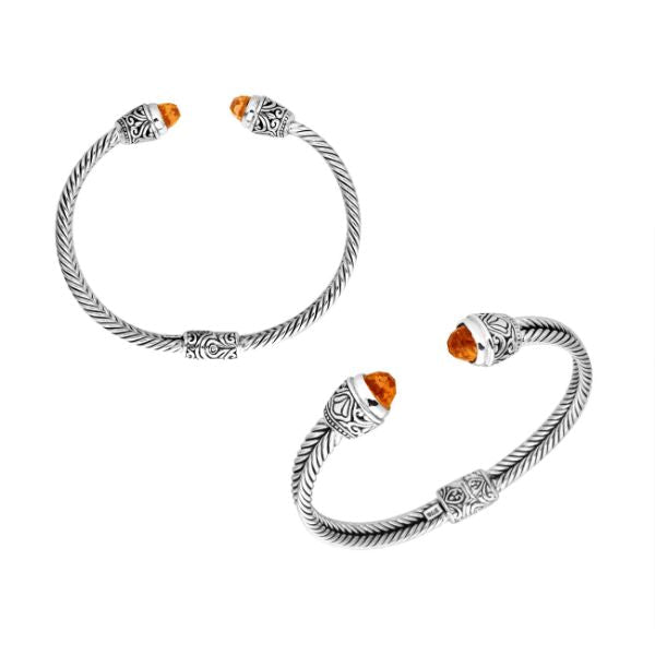 Sterling silver wholesale bangle with twisted rope design, Citrine Quartz end caps, and Balinese handcrafted motifs.