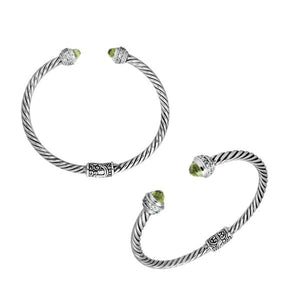 Sterling silver wholesale bangle with twisted rope design, Green Amethyst Quartz and Cubic Zirconia accents, handcrafted Balinese motifs.