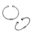 Sterling silver wholesale bangle with twisted rope design, Black Onyx and Cubic Zirconia accents, handcrafted Balinese motifs.