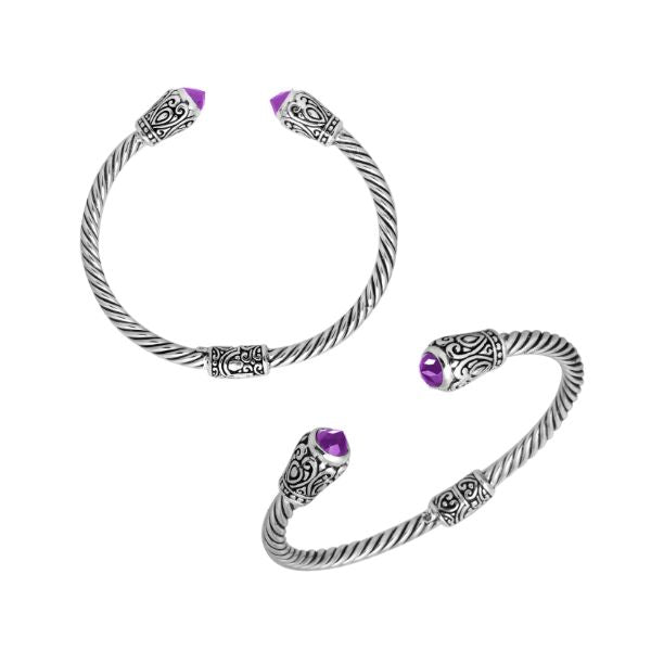 Sterling silver twisted bangle with amethyst quartz ends and Balinese carvings, handcrafted in Bali