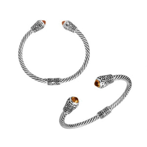 Sterling silver twisted bangle with citrine quartz ends and Balinese carvings, handcrafted in Bali