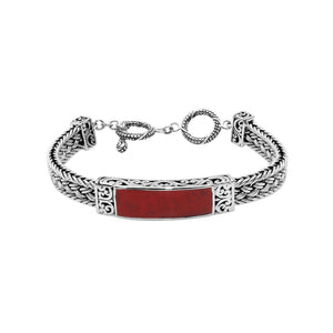 Sterling silver bracelet with Coral inlay and toggle lock handcrafted in Bali.