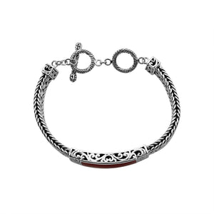 Sterling silver bracelet with Coral inlay and toggle lock handcrafted in Bali.
