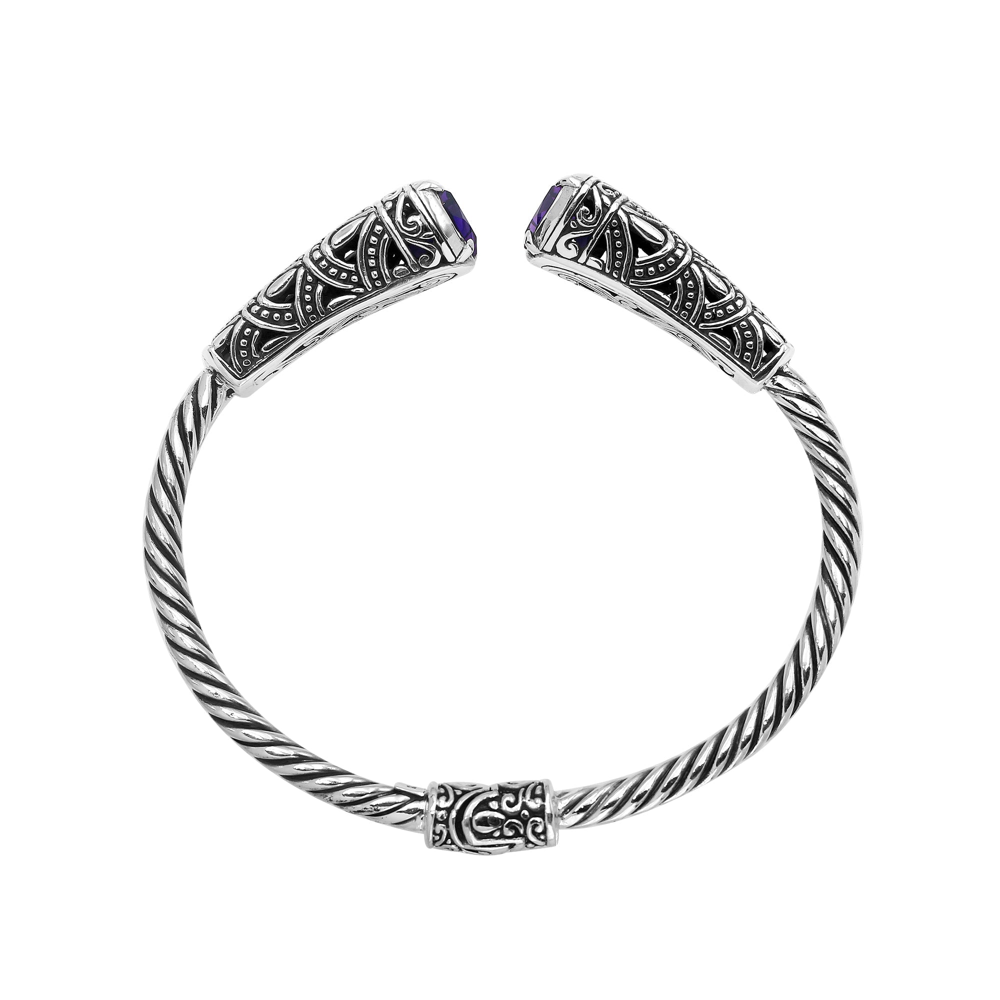 Sterling silver twisted bangle with amethyst quartz ends and oxidized Balinese design